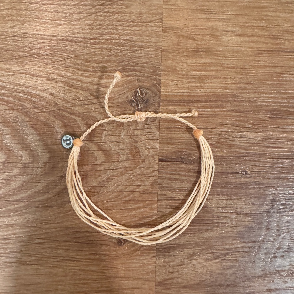 Pura Vida peach string pull tie bracelet